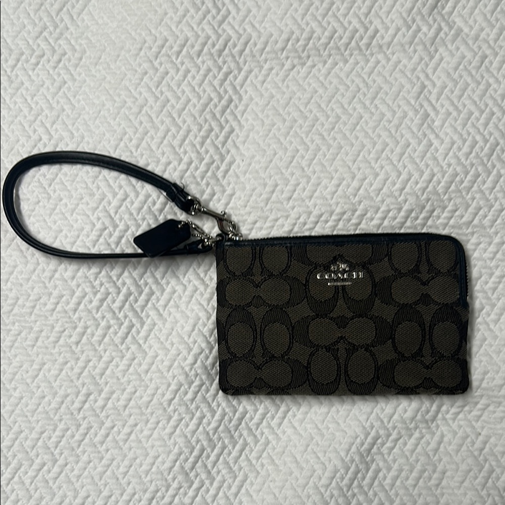 Coach Signature Wristlet in Black and Brown